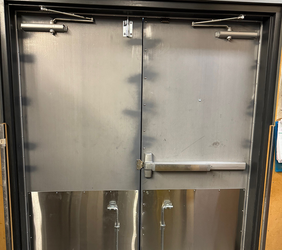 Steel door with panic bar