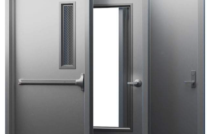 The image shows three commercial steel doors side by side. Each door has a slightly different design: Left Door: A solid steel door with a small, rectangular, wire-reinforced glass window near the top. It features a horizontal push bar, indicating it may be an emergency exit or fire-rated door. Middle Door: A steel door with a large, clear glass window, framed in metal. It has a standard lever-style handle. Right Door: A plain steel door with no windows or additional features, equipped with a simple lever handle.