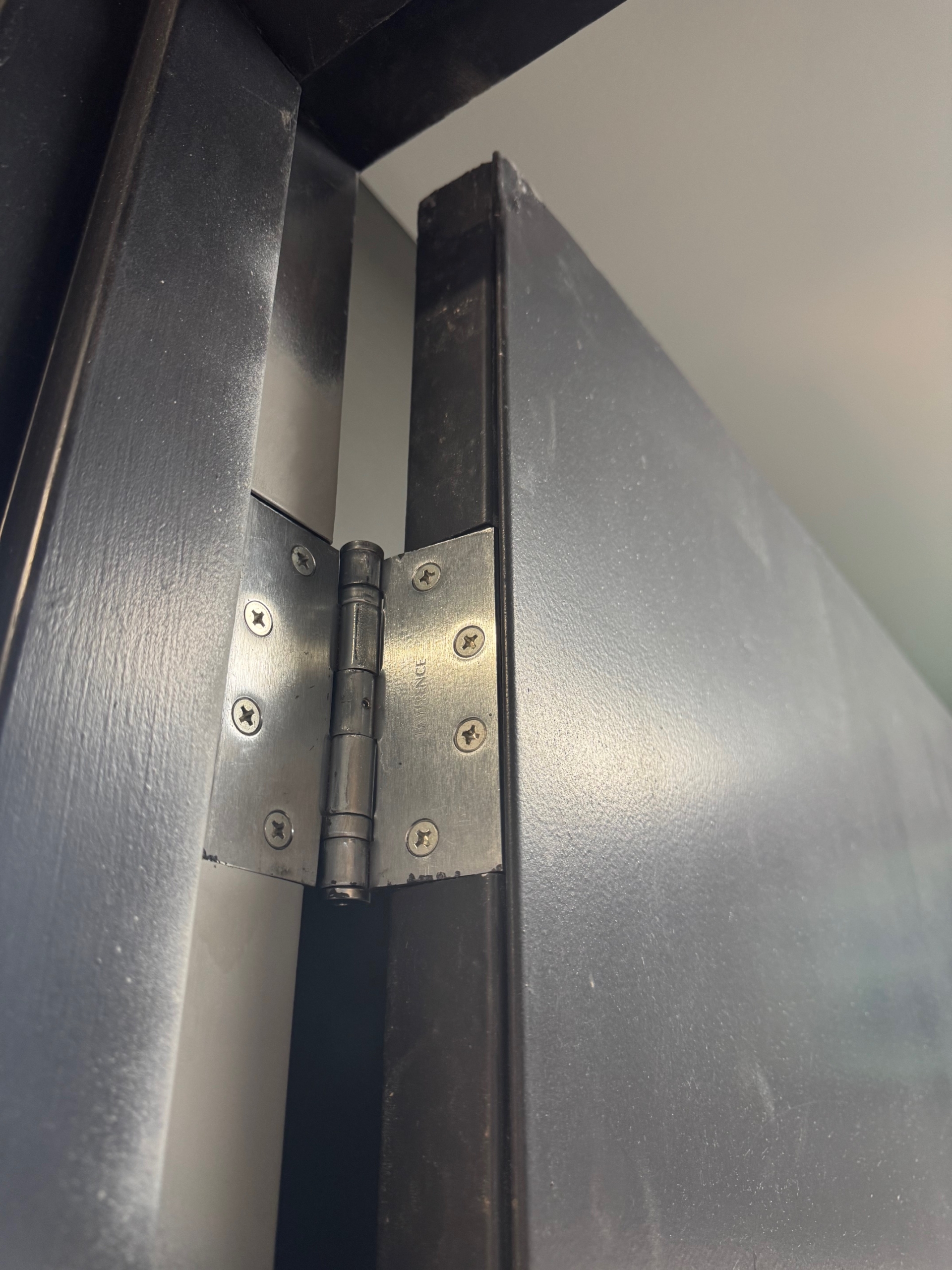 Commercial door NRP hinge correctly installed on steel door